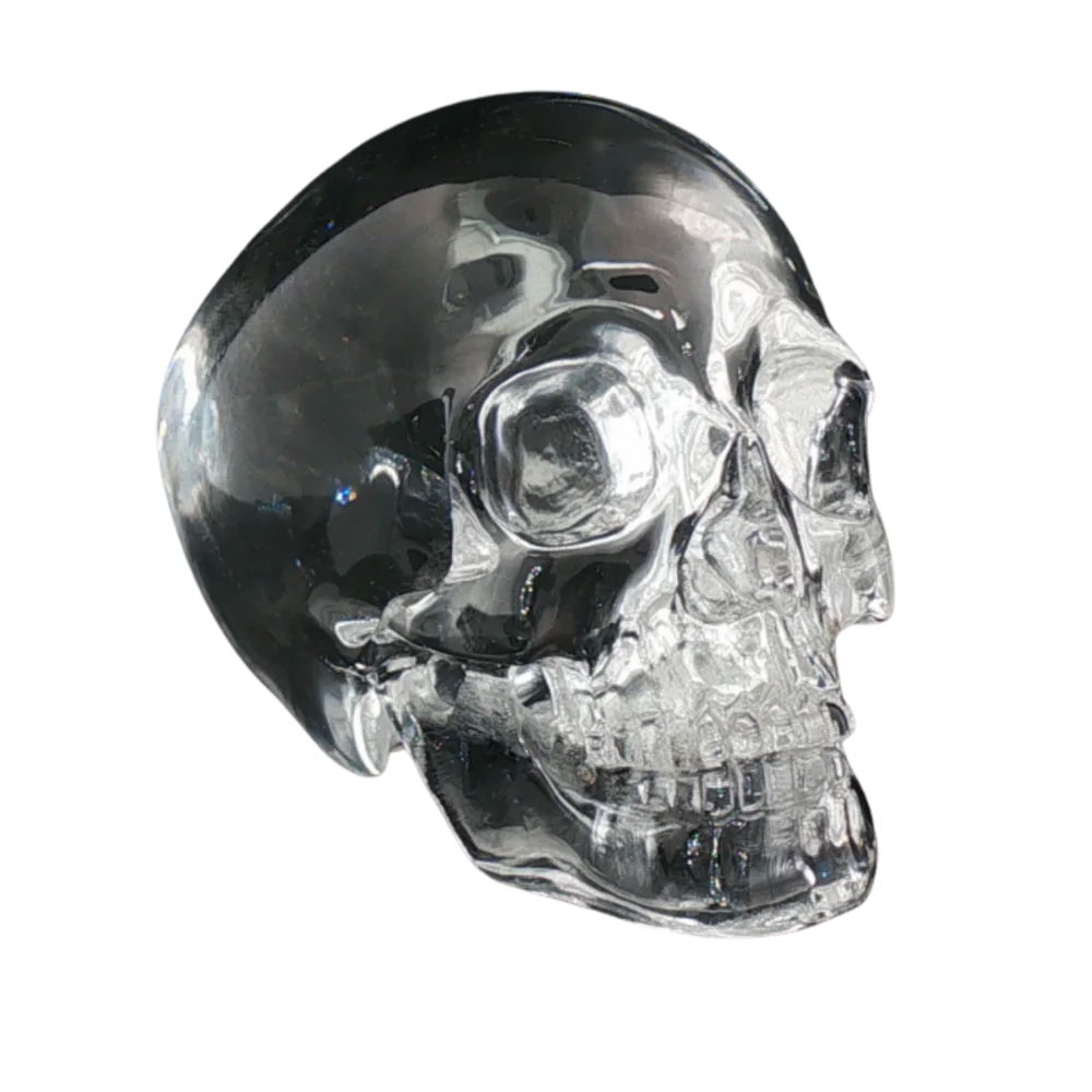 Vanitas — clear quartz skull carving