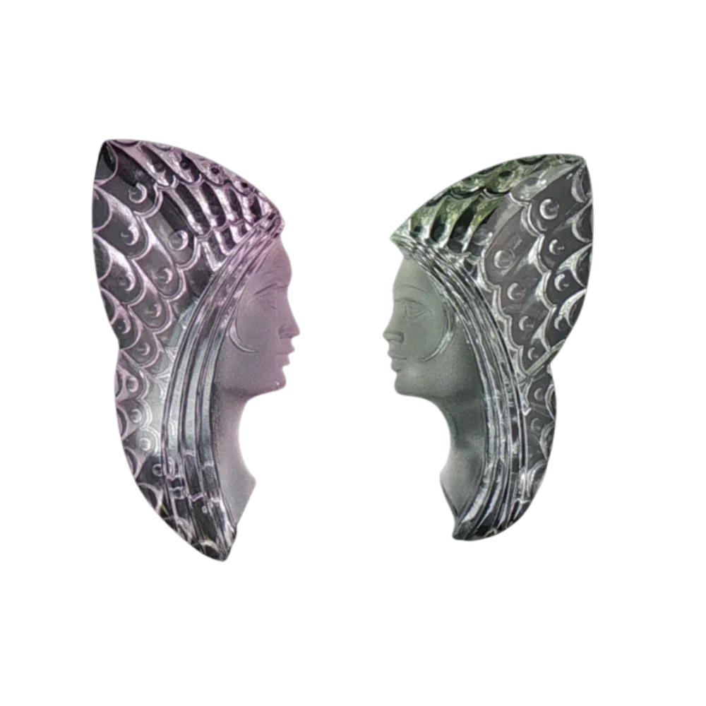 Symmetry of Souls — carved profile pair