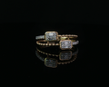 Double emerald diamond ring