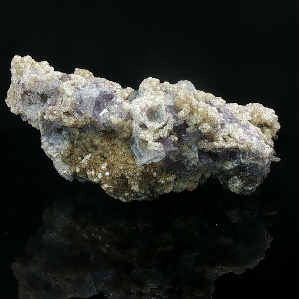 Fluorite, calcite on quartz