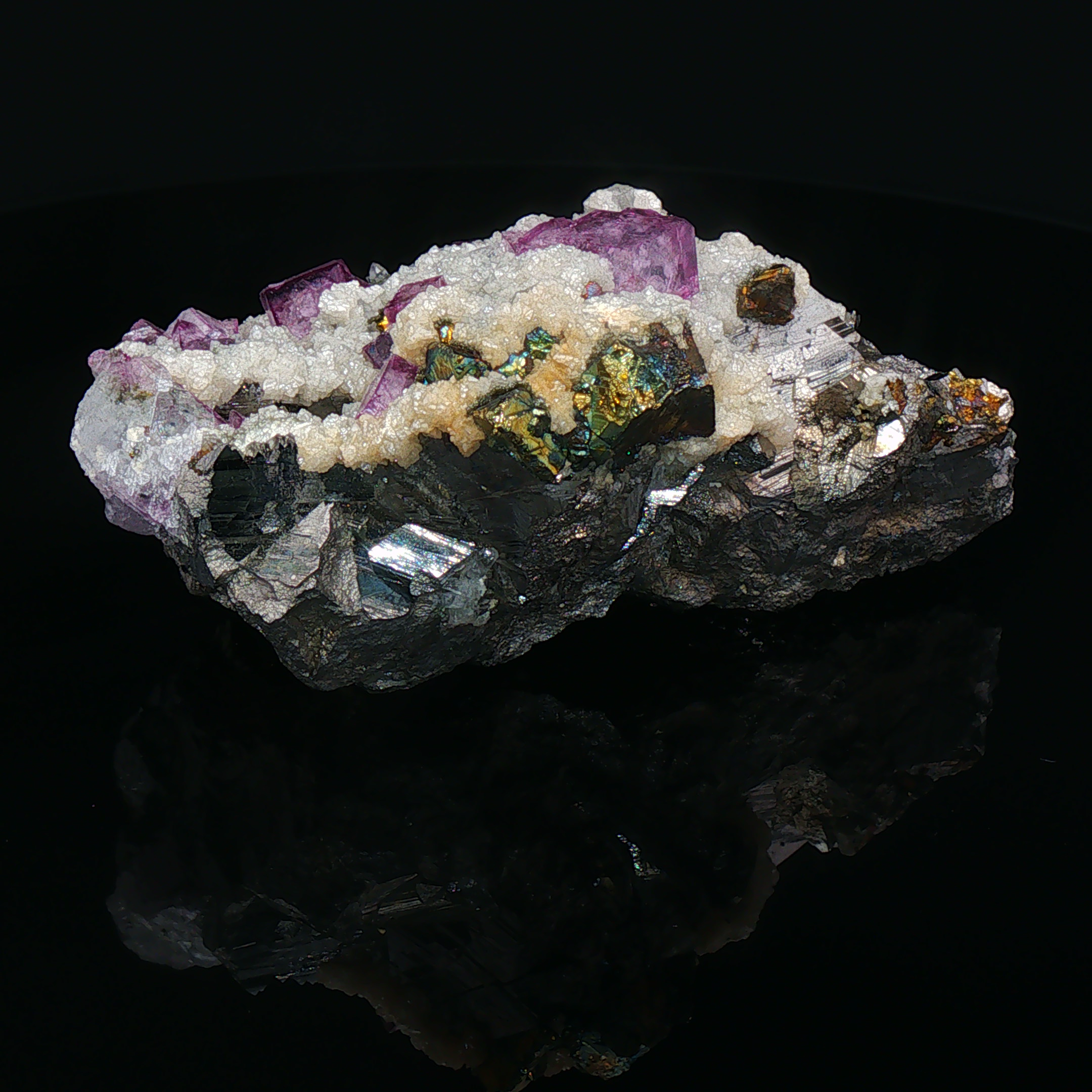 Fluorite, calcite on arsenopyrite