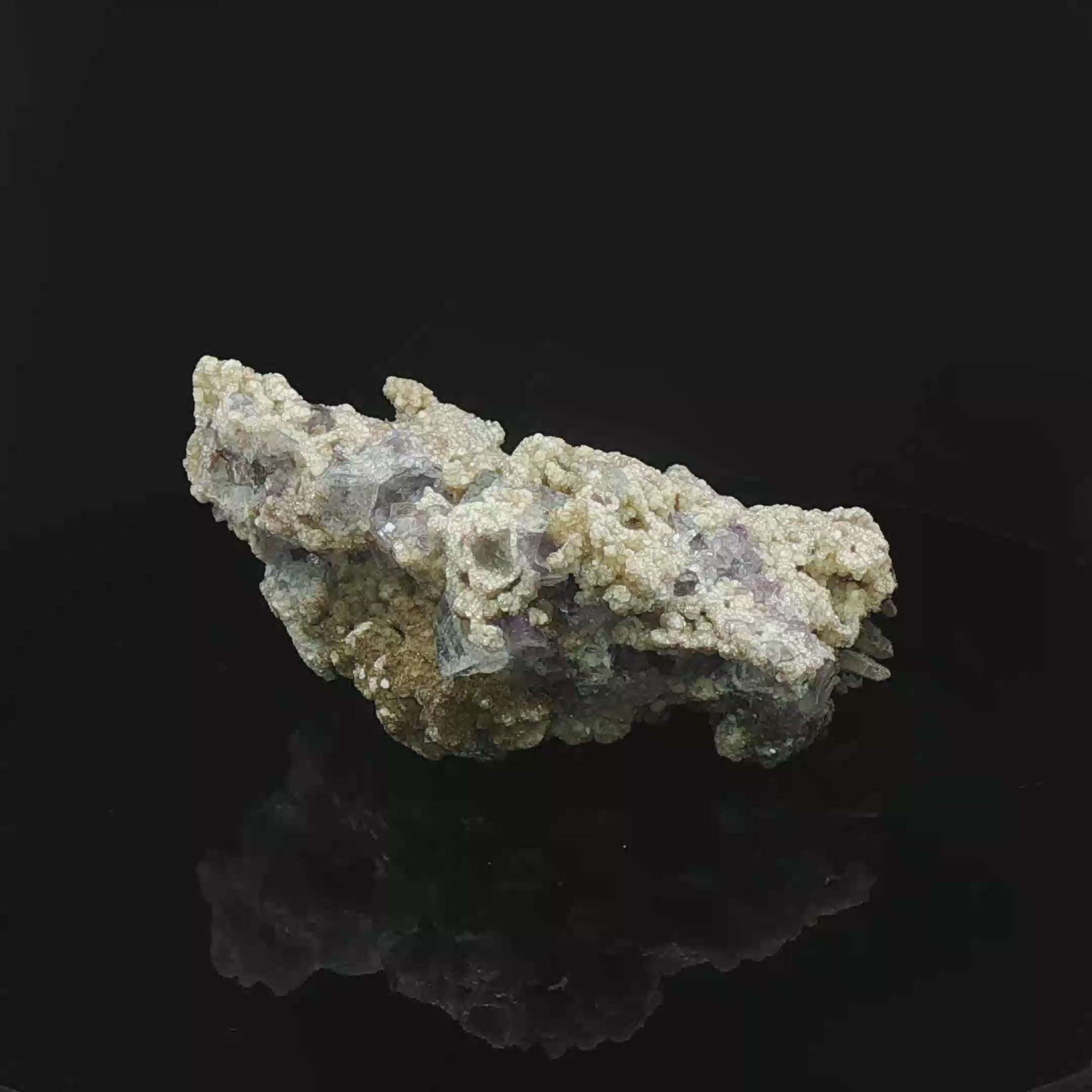 Fluorite, calcite on quartz