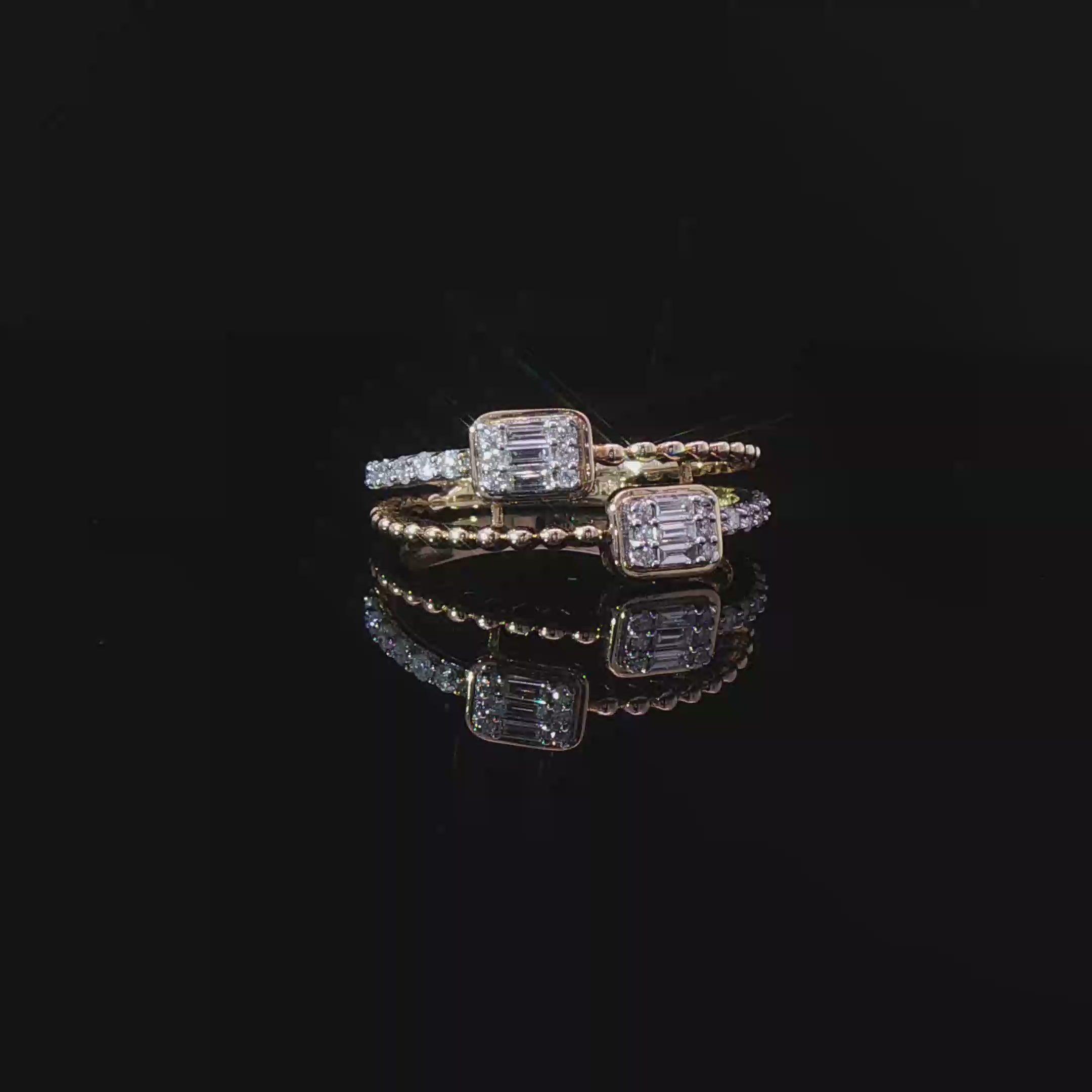 Double emerald diamond ring